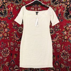 AQUA white dress size M, tight fitting stretchy beautiful and stylish